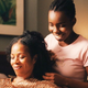 Kim Wayans and Adepero Oduye in Pariah (the Daily Beast)